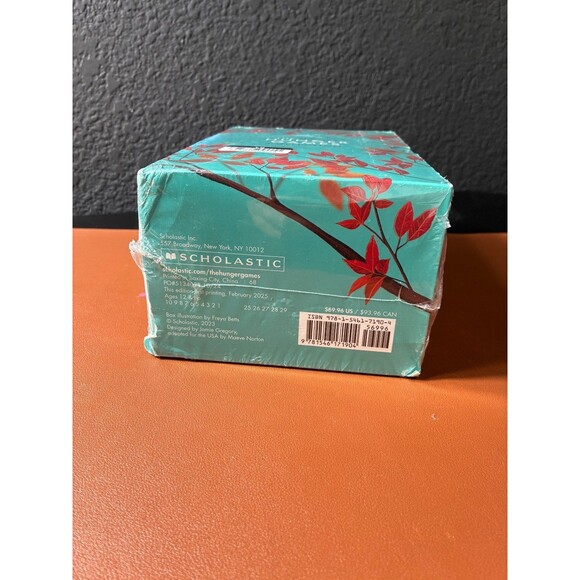 The Deluxe Hunger Games Collection by Suzanne Collins Paper Back  4 Books - Picture 5 of 5